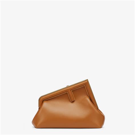 brown fendi handbag|fendi first clutch.